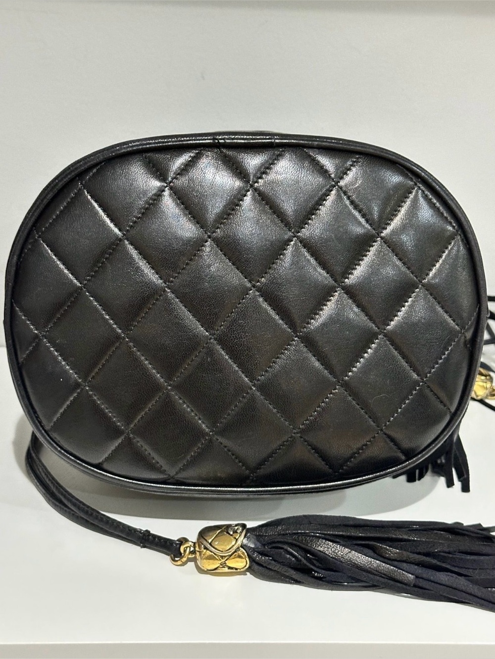 CHANEL Black Quilted Leather Bucket Bag with Gold Chain & Tassels - Picture 2 of 3
